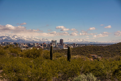 Tucson with downtown and snow caps, rare to see